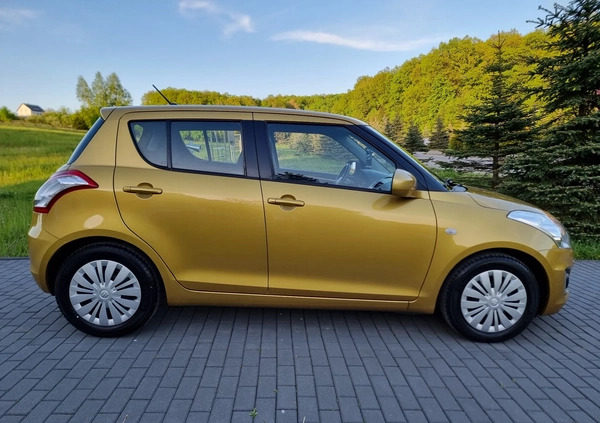 Suzuki Swift cena 35900 przebieg: 106000, rok produkcji 2014 z Gostyń małe 497